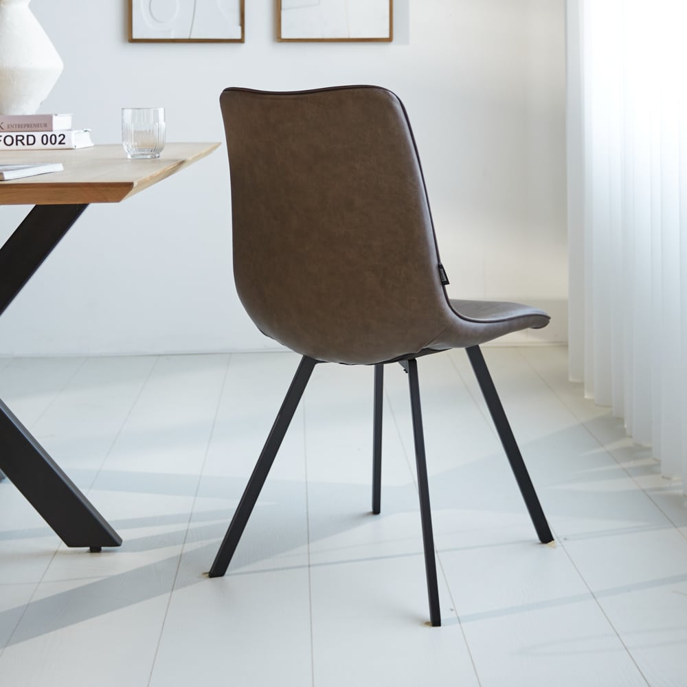 Dining room chair Jimmy Faux leather Dimehouse Taupe LxWxH 75x57x51 Faux leather Atmospheric photo diagonal rear view