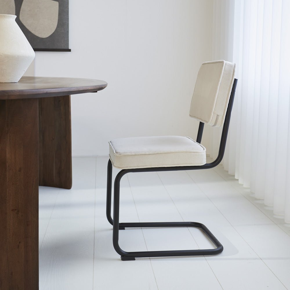 Dining room chair Remo ribbed fabric Dimehouse Beige LxWxH 56x55x52 Rib fabric Atmospheric photo side view