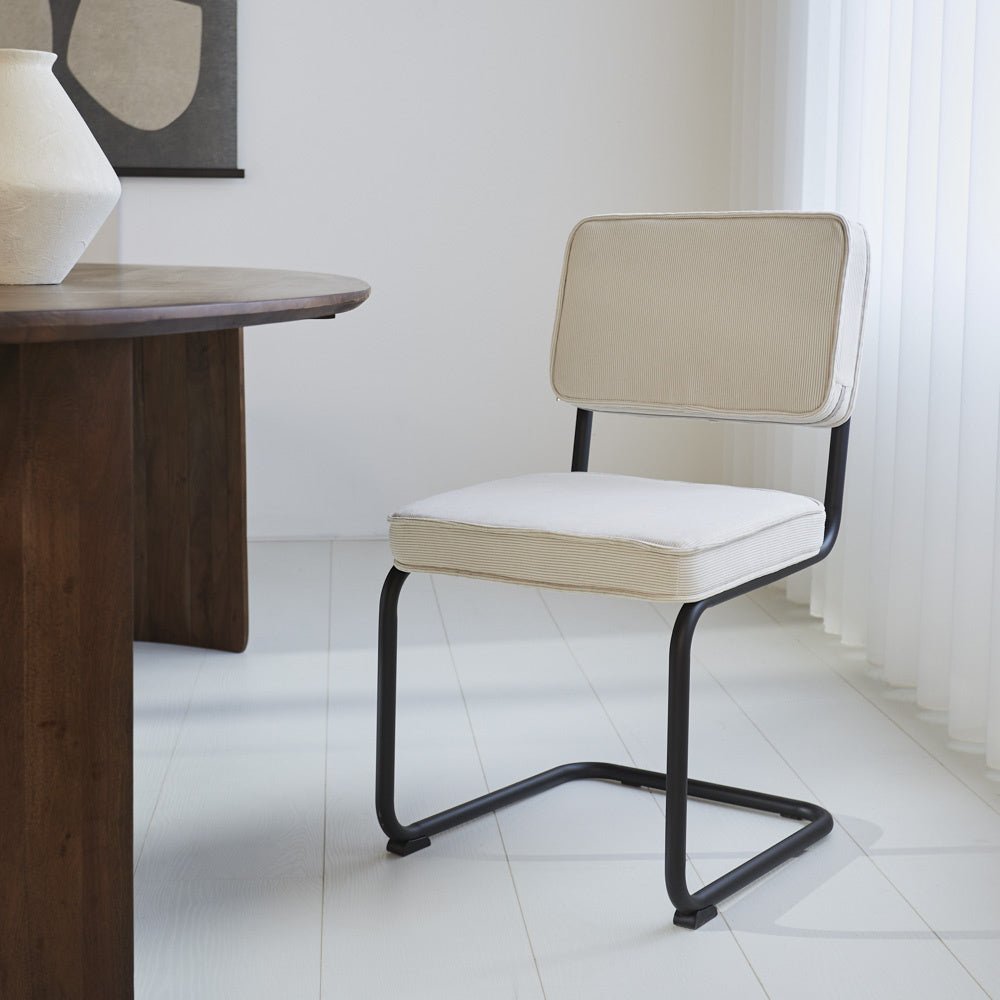 Dining room chair Remo ribbed fabric Dimehouse Beige LxWxH 56x55x52 Rib fabric Atmospheric photo diagonal front view