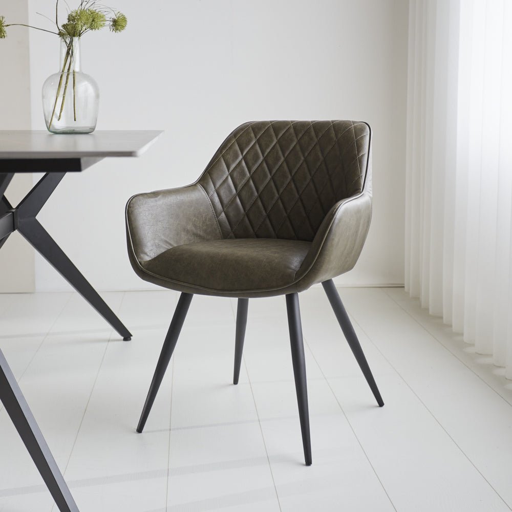 Dining room chair Cara Dimehouse Green LxWxH 78x65x57 Faux leather Atmospheric photo diagonal front view