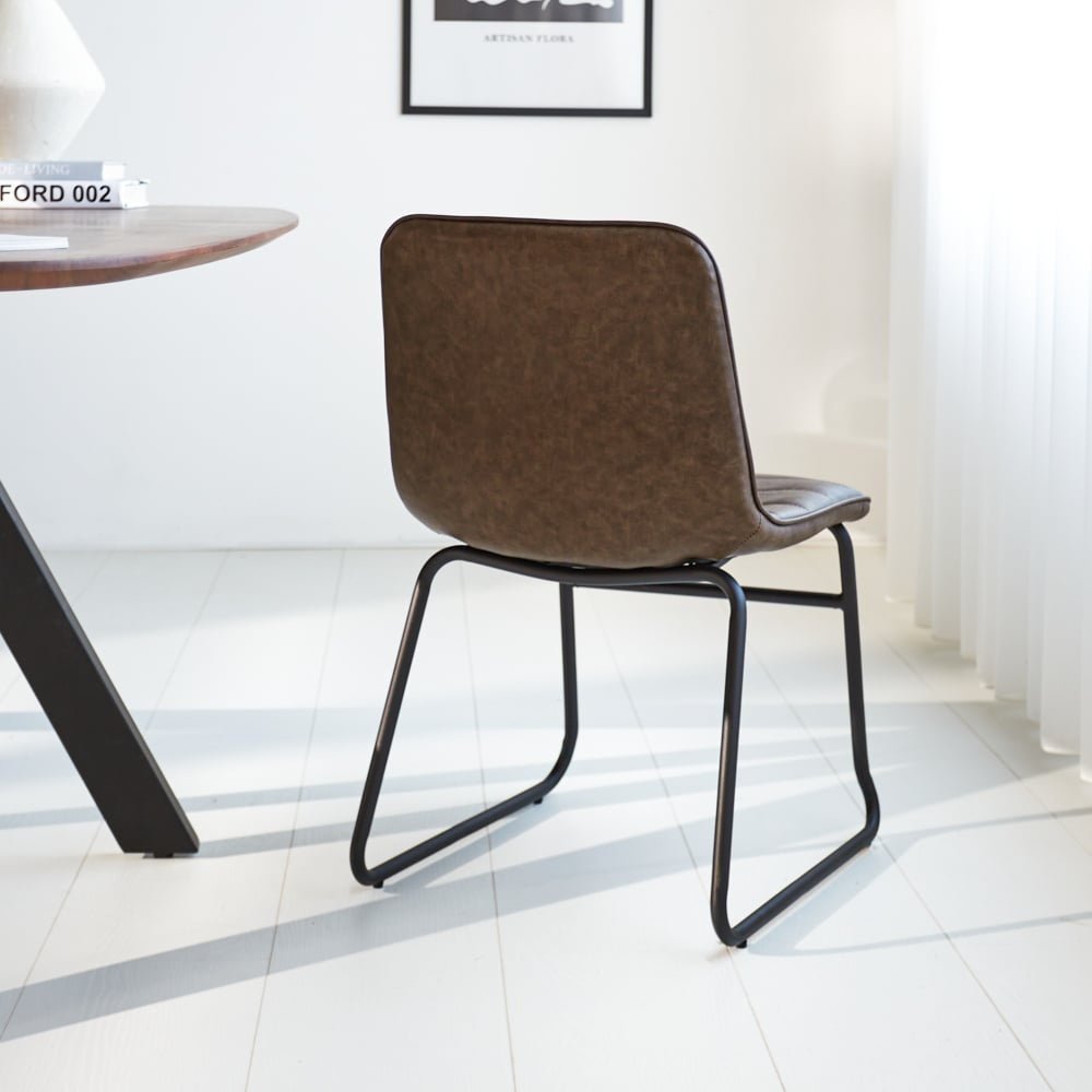 Dining room chair Mark Dimehouse Taupe LxWxH 74x56x54 Faux leather Atmospheric photo diagonal rear view