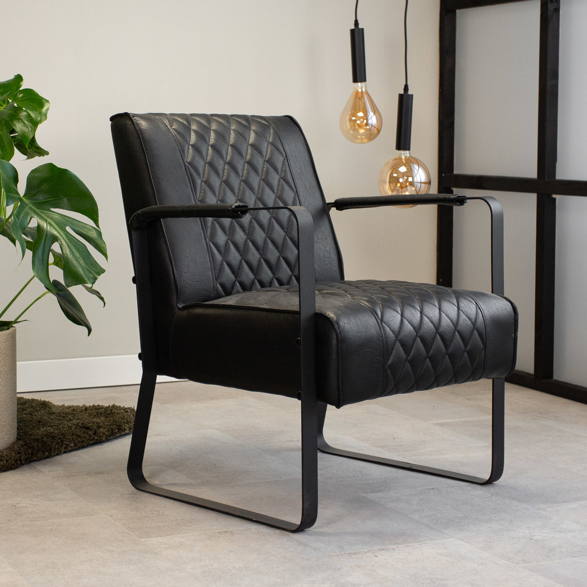 Armchair Peter Dimehouse Black LxWxH 68x63x45 Faux leather Atmospheric photo diagonal front view