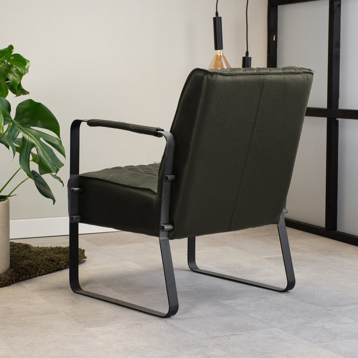 Armchair Peter Dimehouse Green LxWxH 68x62x45 Faux leather Atmospheric photo diagonal rear view