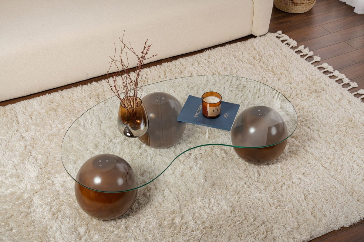 Coffee tables - Organic coffee table transparent glass walnut ball legs Sphere 120x70 cm - Dimehouse