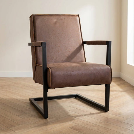 Industrial leather armchair taupe Tiger mood photo in a modern interior
