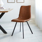 Dining room chair Jimmy Faux leather Dimehouse Cognac LxWxH 75x57x51 Faux leather Atmospheric photo diagonal front view