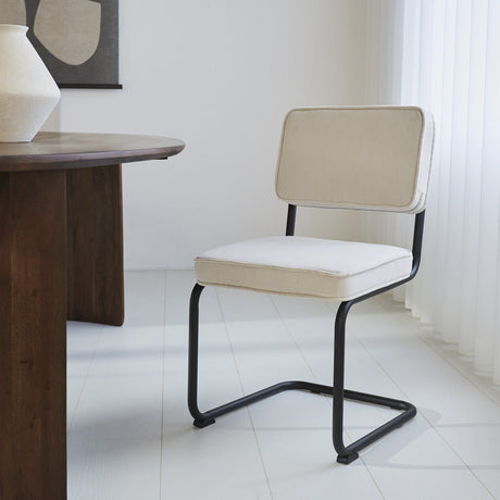 Dining room chair Remo ribbed fabric Dimehouse Beige LxWxH 56x55x52 Rib fabric Atmospheric photo diagonal front view