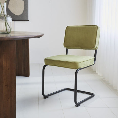 Dining room chair Remo ribbed fabric Dimehouse Green LxWxH 56x55x52 Rib fabric Atmospheric photo diagonal front view
