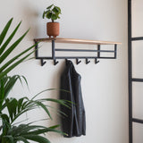 Coat rack Niels DH Interior Acacia LxWxH 102x37x30 Acacia wood Atmospheric photo diagonal front view