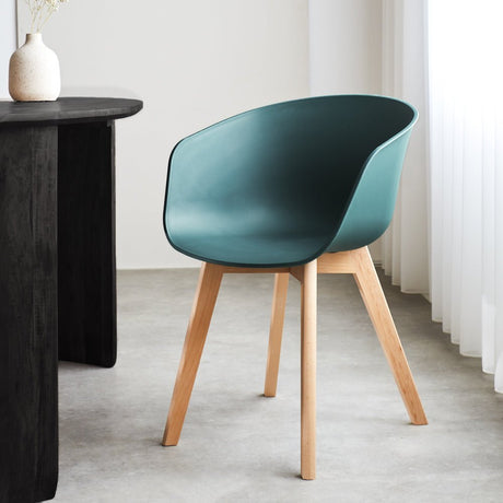 Herning dining room chair Dimehouse Green LxWxH 68x60x51 Plastic Atmospheric photo diagonal front view