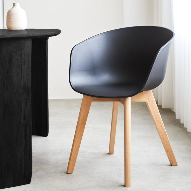 Herning dining room chair Dimehouse Black LxWxH 68x60x51 Plastic Atmospheric photo diagonal front view