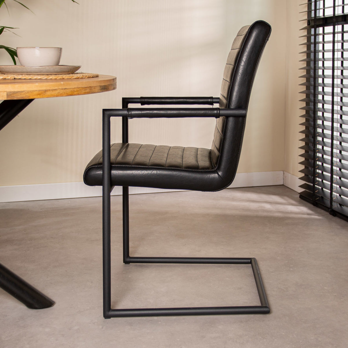 Dining room chair Bras Dimehouse Black LxWxH 73x59x58 Faux leather Atmospheric photo side view