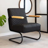Armchair Lars Dimehouse Black LxWxH 68x64x39 Faux leather Atmospheric photo diagonal front view